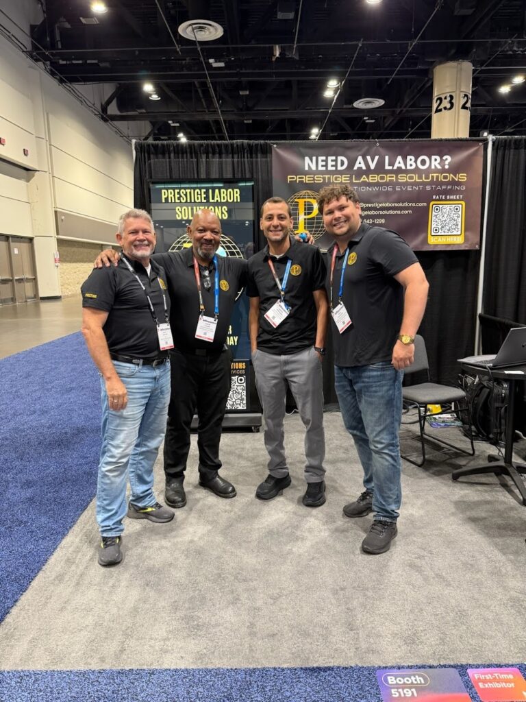 Kyle P. McAuliffe and the PLS team networking at a major industry tradeshow as a premier AV labor source.